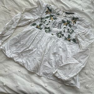 Blouse embroidered baby doll style